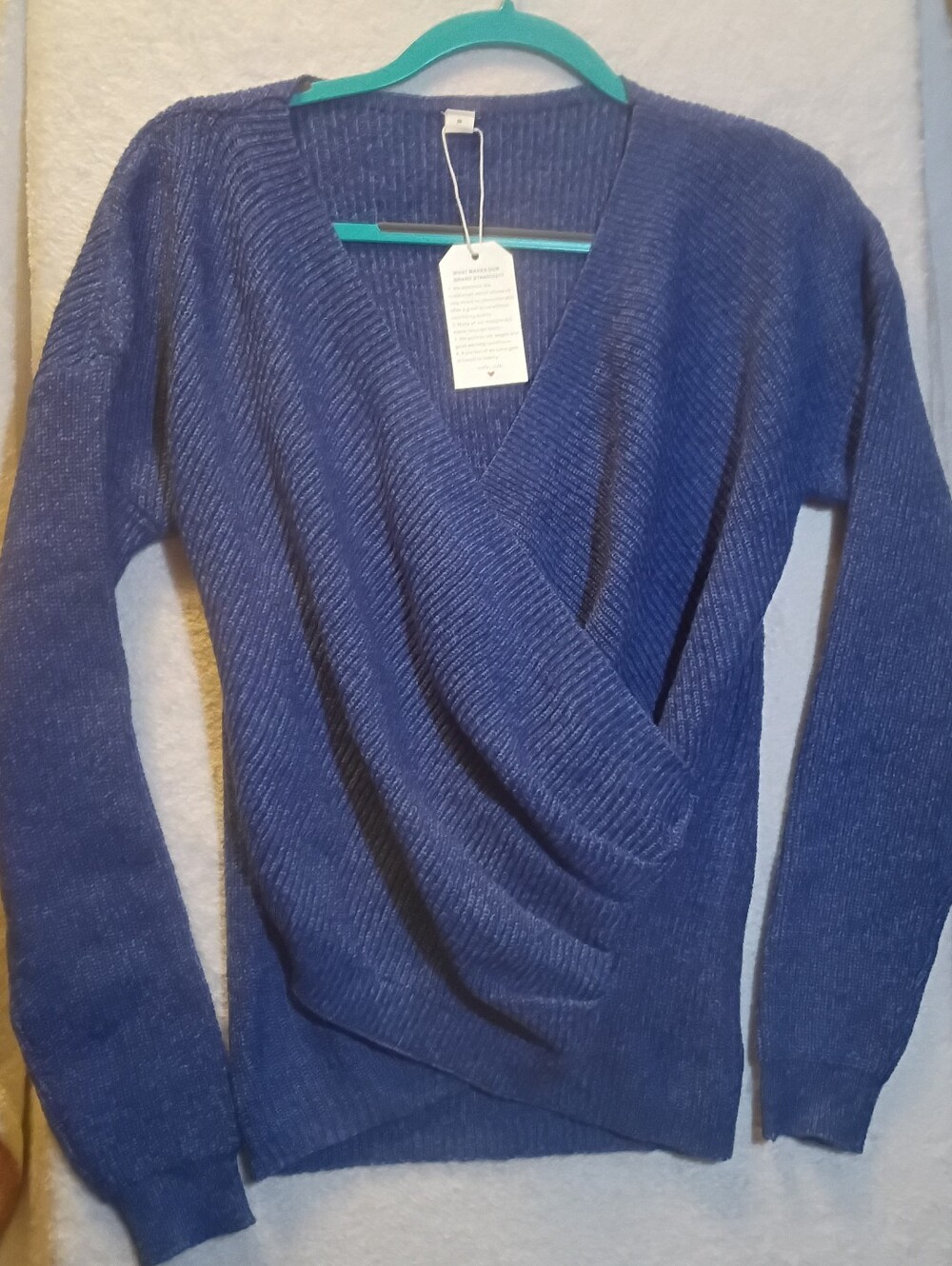 Wrap-front long sleeve knit top